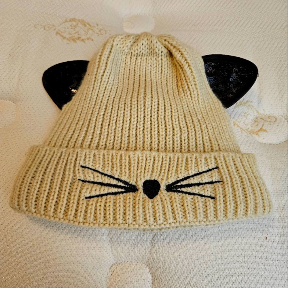 Kitty cat knit hat. Beige with black sequins on the cute ears. New without tags.